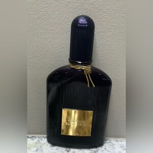 Tom Ford Velvet Orchid Bottle in Deep Purple with Gold Accents